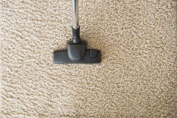 Hoovering the carpet