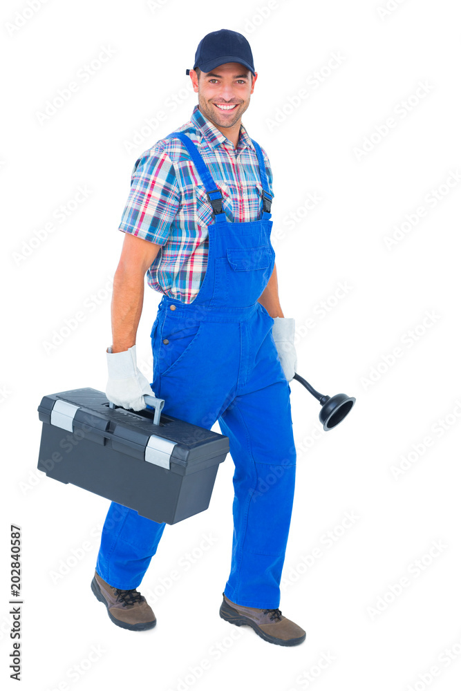 Poster Happy plumber with plunger and toolbox walking on white background