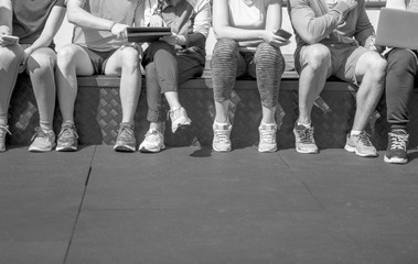 Group of diverse athletes sitting together