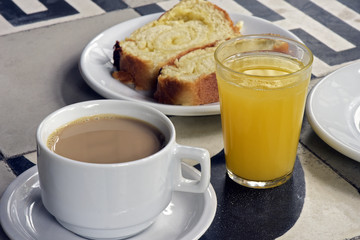 Brazilian breakfast with coffe and milk