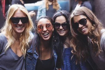 Portrait of female friends wearing sunglasses
