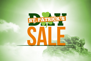 patricks day sale ad against large rock overlooking bright sky