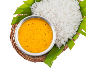 Indian Traditional Cuisine Dal Fry or Rice Also Know as Dal Chawal, Daal Chawal, Dal Rice, Whole Yellow Lentil with Rice or Dal Tadka, Daal Fry Served with Rice isolated on White Background - obrazy, fototapety, plakaty