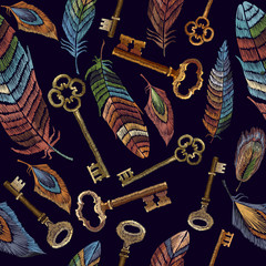 Color feathers and vintage keys embroidery seamless pattern. Fashionable template for design of clothes, t-shirt design