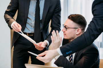 coworkers communication. business man overwhelmed with information from his employees. boss...