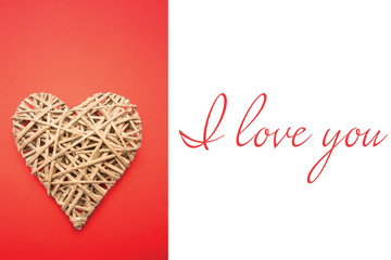 Wicker heart ornament  against i love you