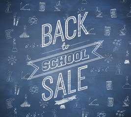 Fototapeta na wymiar Back to school sale message against blue chalkboard