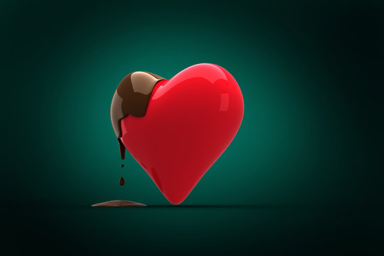 Heart dipped in chocolate against green background with vignette