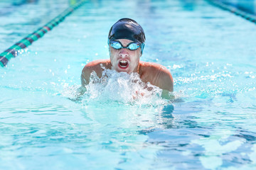 Fototapeta na wymiar Breaststroke swimmer