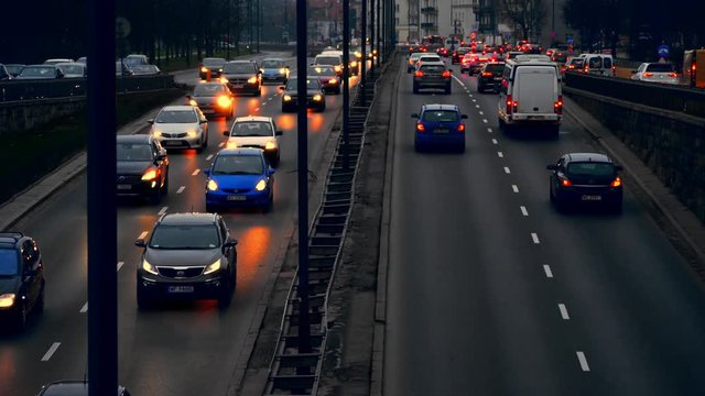 Warsaw, Poland- December 26, 2017 Evening traffic in the city of Warsaw. Cars are slow going.