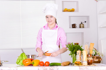 beautiful  girl wearing chef uniform cooking