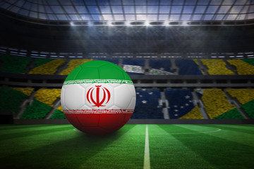 Football in iran colours in large football stadium with brasilian fans
