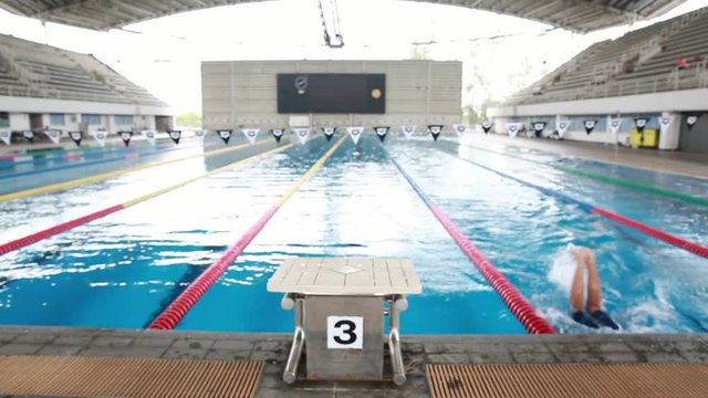 Swimmer practice in swimming pool