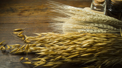 rice oat and wheat on wood table for background.