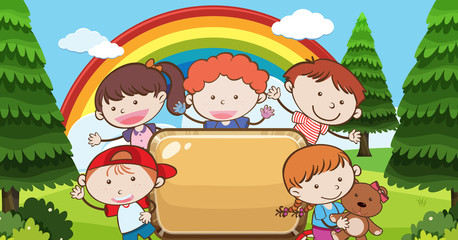 Obraz na płótnie Canvas Kid Under Rainbow with Banner