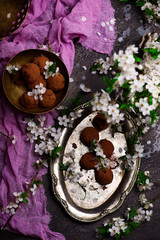 Fototapeta na wymiar plum blossom chocolate truffles.style rustic