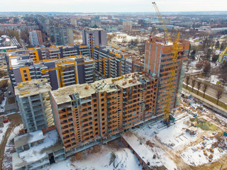 birds eye view on contraction site with crane