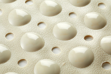 Fototapeta na wymiar Textured under surface of a rubber bath mat