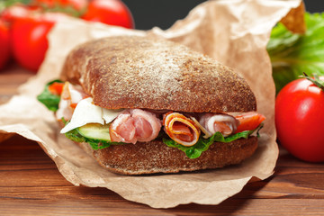 sandwich on a wooden table