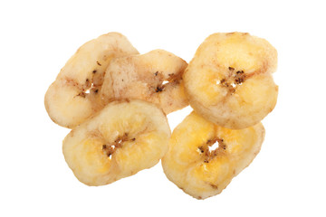 Dried banana chips isolated on white background. Top view. Flat lay