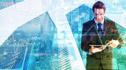 Fototapeta premium Businessman standing while using a tablet pc against new york