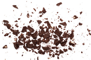 Dark chocolate pieces with almond and nougat, shavings isolated on white background