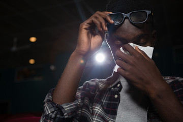 Man getting emotional while watching movie