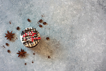 Chocolate cupkcakes with meringue on blue stone background
