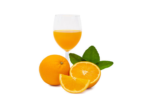 a glass of fresh orange juice and group of fresh orange fruits with green leaves, isolated on white background with clipping path. fruit product display or montage, studio shot