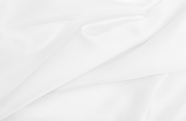 Obraz premium Smooth elegant white silk or satin luxury cloth texture as wedding background. Luxurious background design