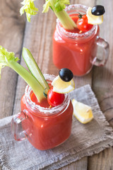 Tomato juice in the mason jars