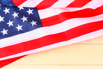 American Flag Over Whitewashed Wood Background For United States Holidays.