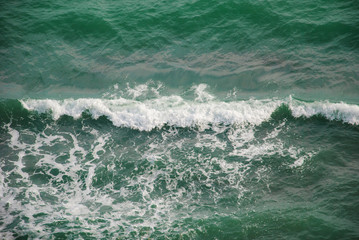 Storm at sea, top view, wave in the center