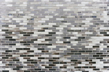 Grey brick wall background texture