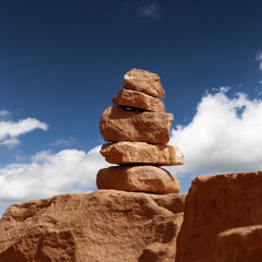 Fototapeta na wymiar Signposts made of stacked stones from sandstone in the Wadi Rum Nature Reserve, Jordan