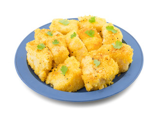 Indian Street Food Khaman Dhokla is a Food Common in The Gujarat State of India Made From Soaked And Freshly Ground Channa Dal or Channa Flour isolated on White Background