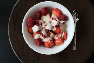 strawberries and raspberries in a bowl 