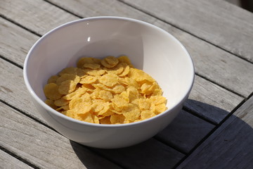 corn flakes in white porcelain bowl
