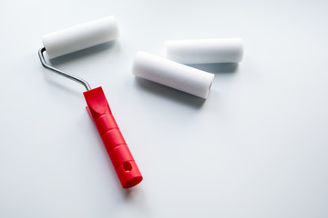Paint roller on a white background. painting, repair and construction concept.