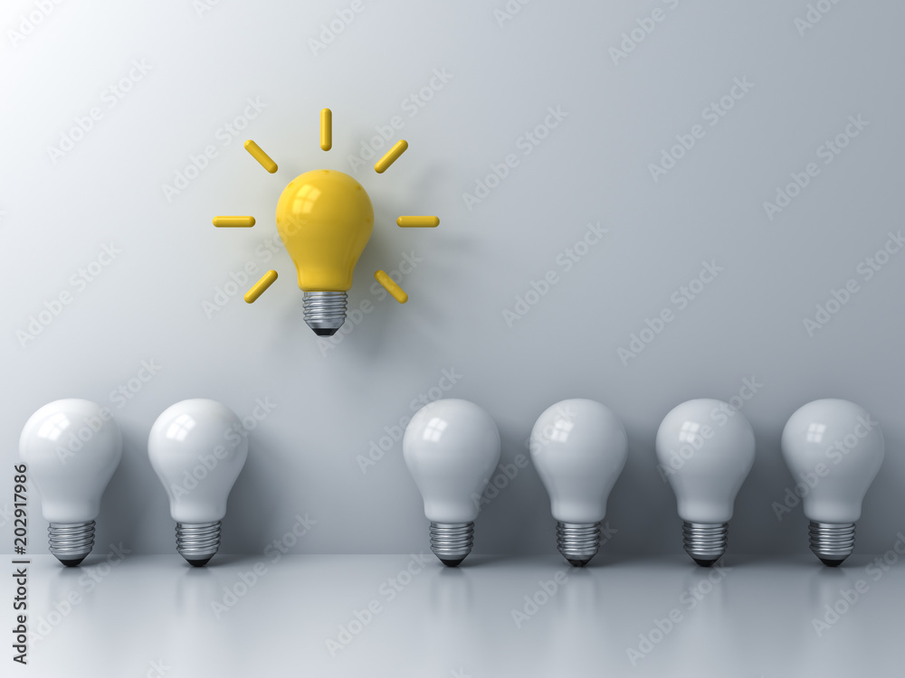 Fototapete think different concept , one yellow idea light bulb standing out from the white unlit bulbs with wi
