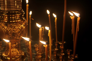Lighted candles in the temple