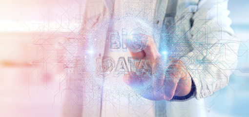 Particles big data title holding by a man