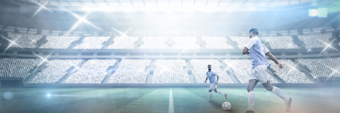 Teamates playing football against stadium against sky