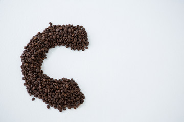 Coffee beans forming alphabet C