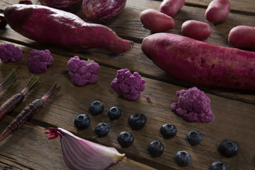Various vegetable arranged on wooden table