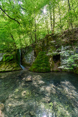 Fototapeta na wymiar Guetersteiner Waterfall of Bad Urach, Swabian Alb, Baden-Wuerttemberg, Germany, Europe
