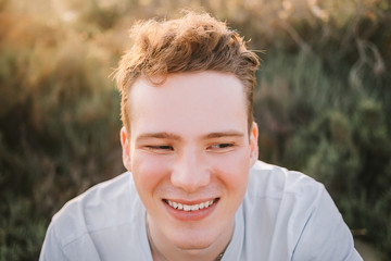 portret of man smiling at sunset © ekaeka