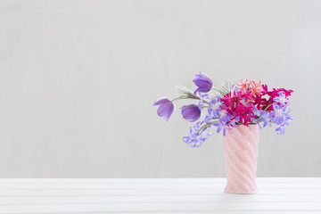 beautiful spring flowers in pink vase