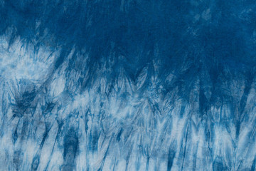 Dyed indigo fabric background and textured