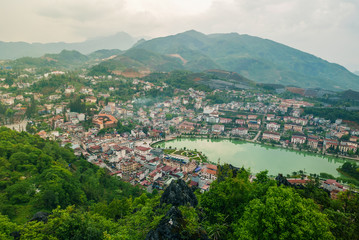 Fototapeta na wymiar Aerial view of landmark landscape at the hill town in Sapa city with the sunny light, Vietnam